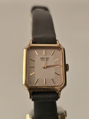 Seiko Gold Tone Rectangular Dress Watch with Black Strap